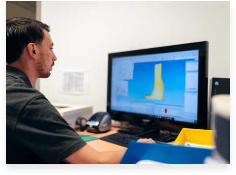 man looking at computer screen