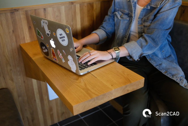 woman sitting in front of computer